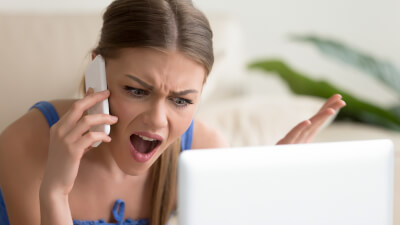 A woman angry on the phone