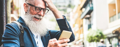 Older man on device